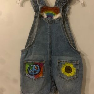 Hand painted sunflower/peace sign overalls.